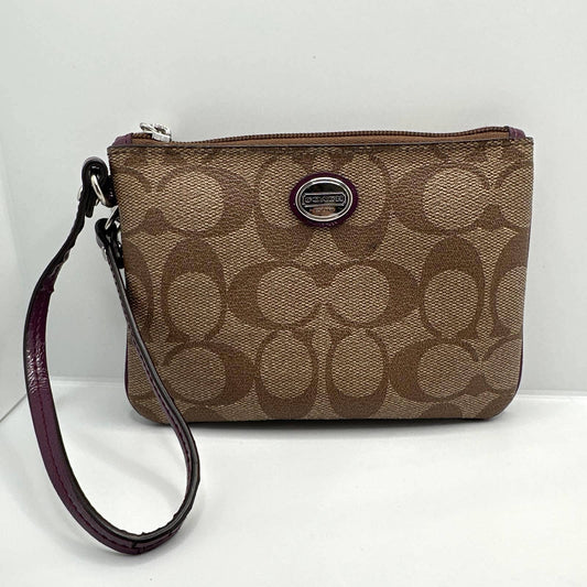 COACH Brown Signature Coated Canvas Wristlet